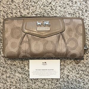 Coach Embossed Brown Wallet